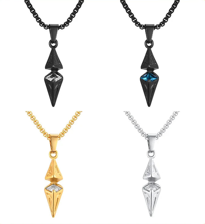 Four geometric pendants on chains in black, gold, and silver on a white background.