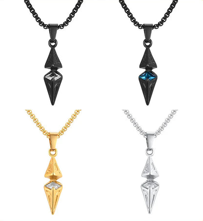 Four geometric pendants on chains in black, gold, and silver on a white background.