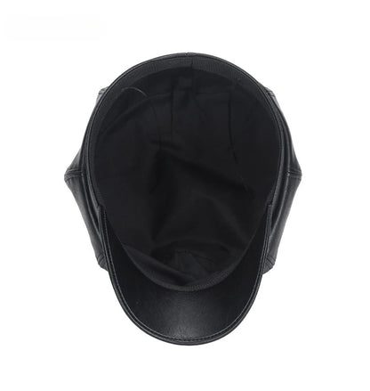 Black leather cap on a white background