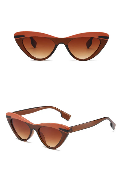 Brown cat-eye sunglasses on a white background.
