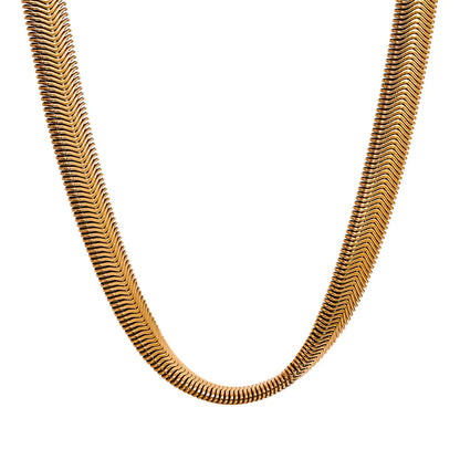 Gold chain necklace on a white background