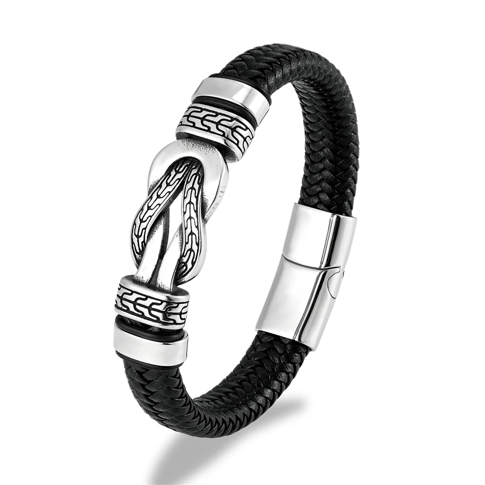 Black braided leather bracelet with silver metal clasp on a white background