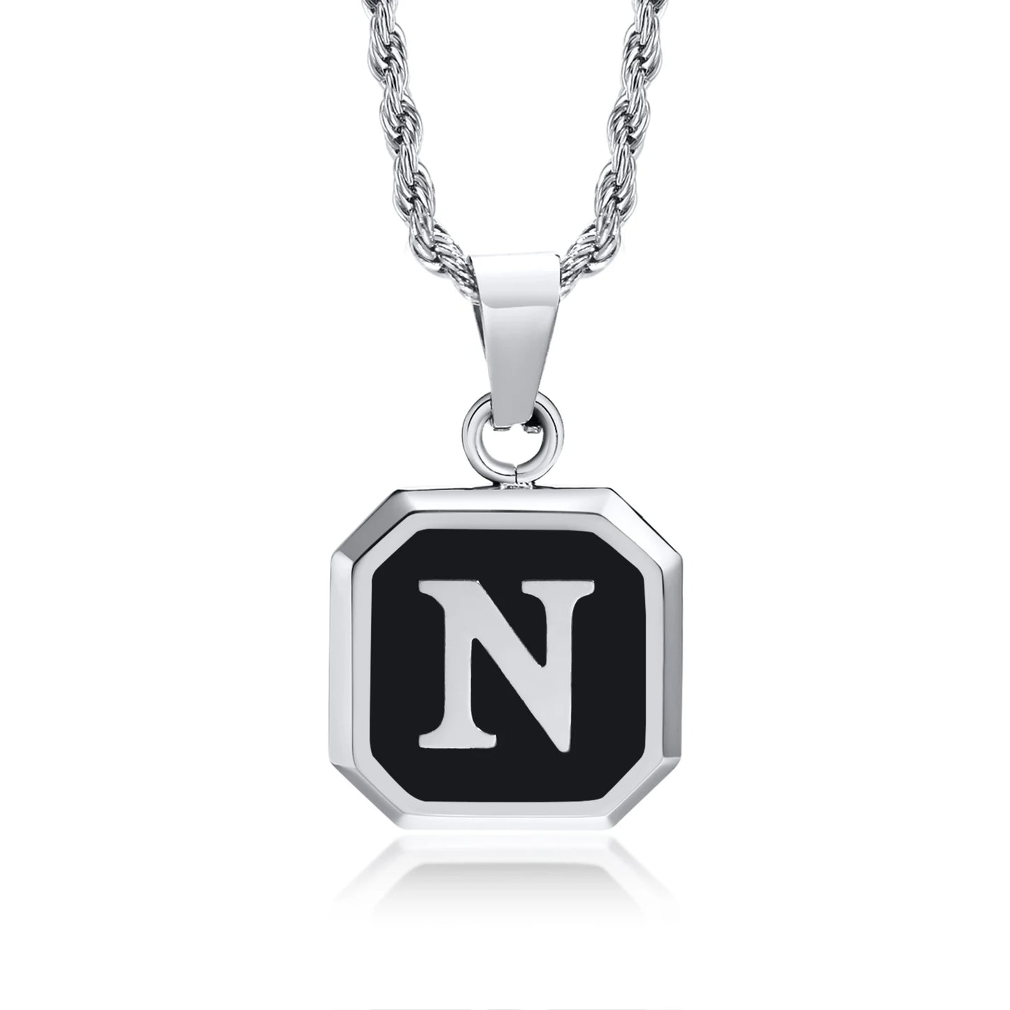 Necklace with a black and silver pendant featuring the letter 'N' on a white background