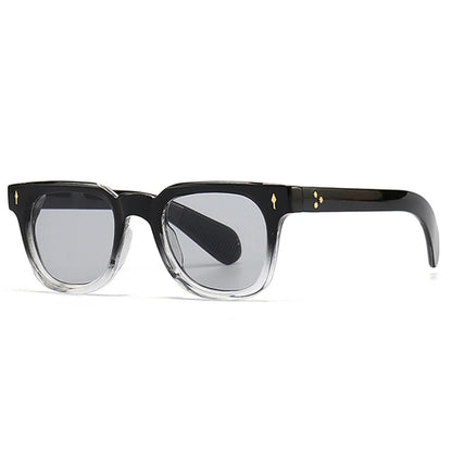 Black sunglasses with gold accents on a white background