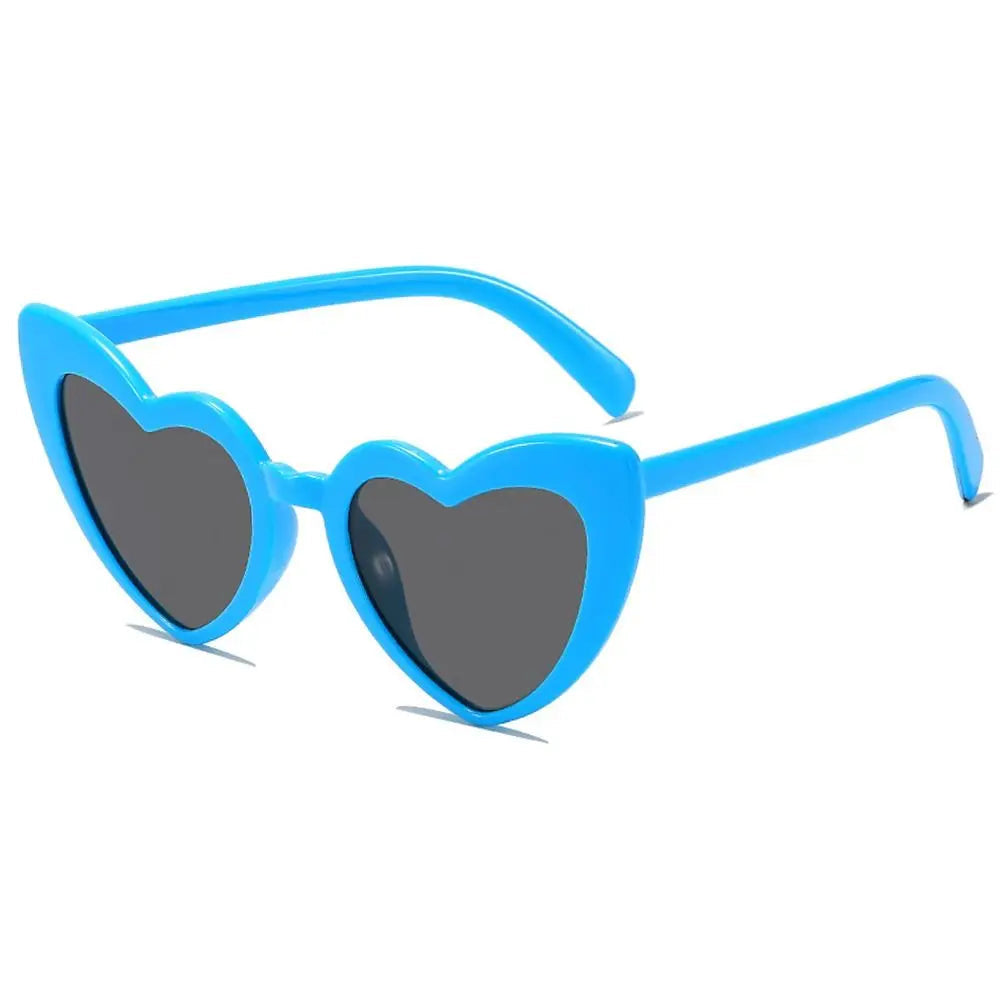 Blue heart-shaped sunglasses on a white background