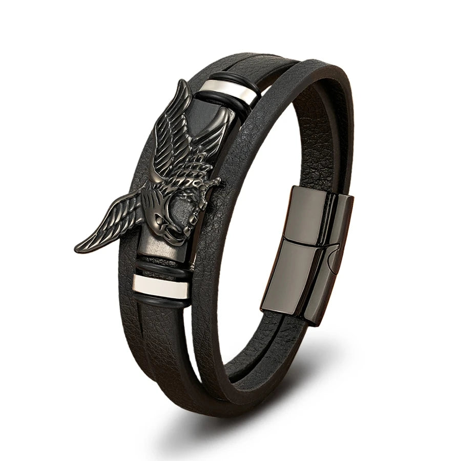 Black leather bracelet with silver eagle emblem and clasp on a white background