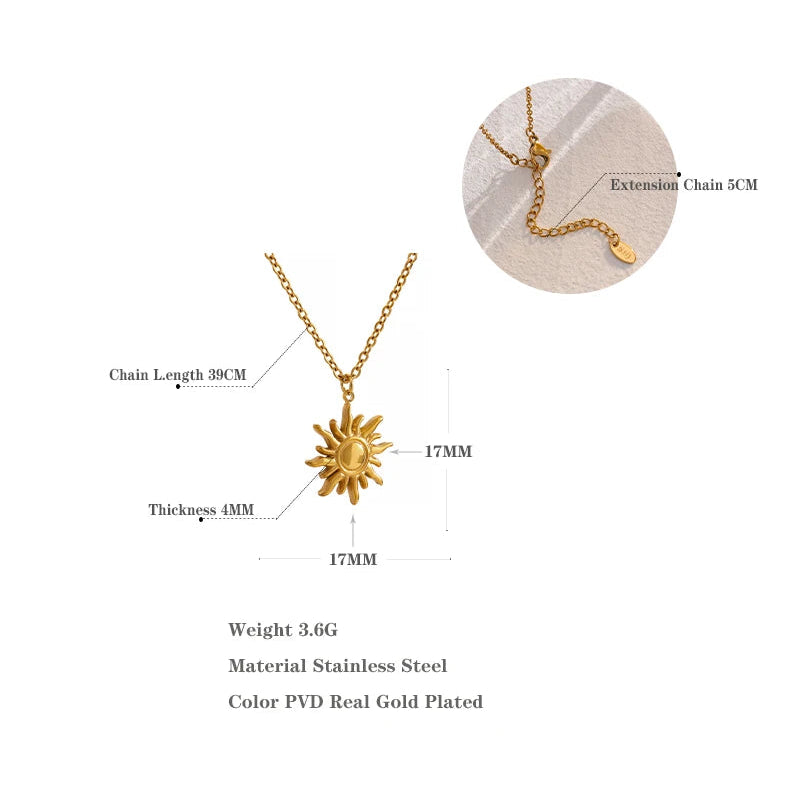 Gold necklace with sun design on a white background