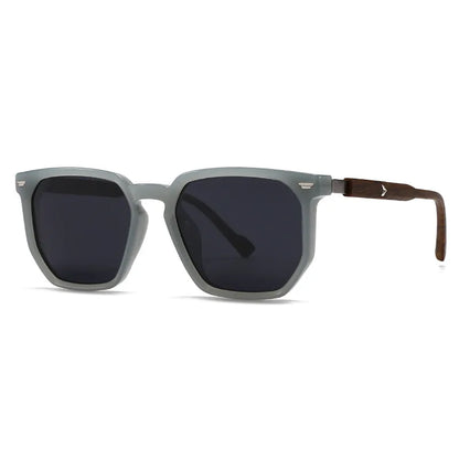 Sunglasses with light grey frame and dark lenses on a white background