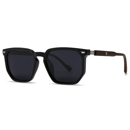 Black sunglasses with dark lenses on a white background