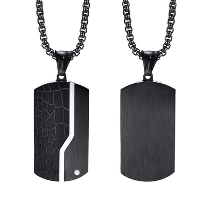 Two black dog tag necklaces on a white background