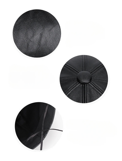 Close-up parts of black leather cap on a white background