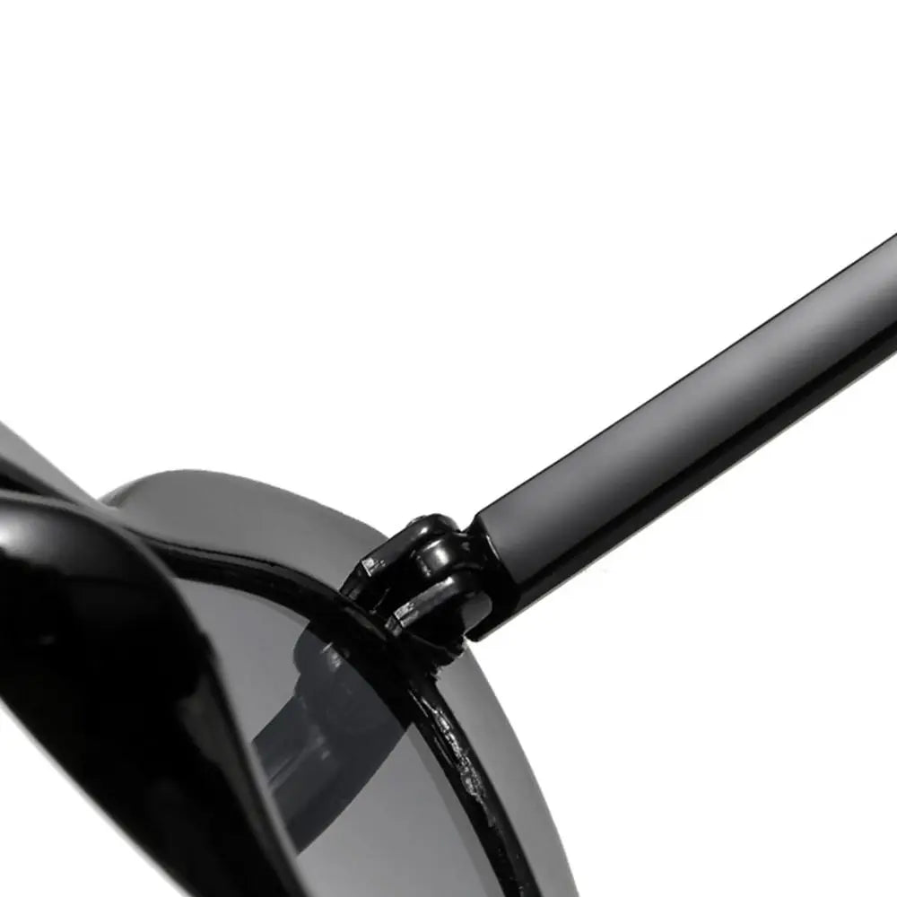 Close-up of a black sunglasses on a white background