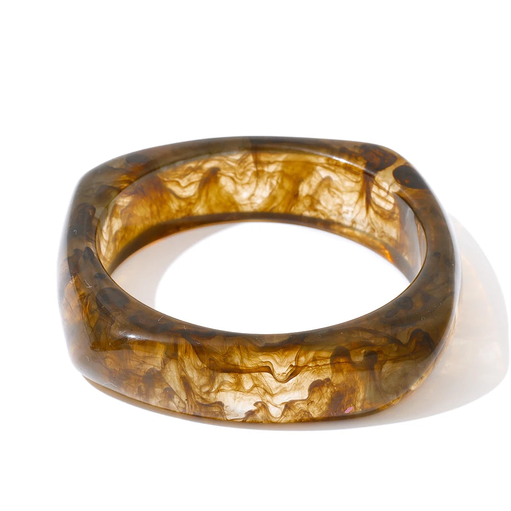 Brown marbled bangle on a white background