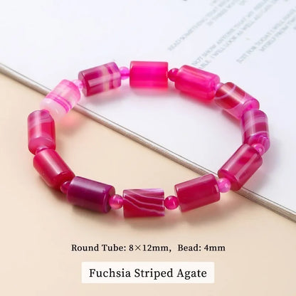 Fuchsia striped agate bracelet on a light background