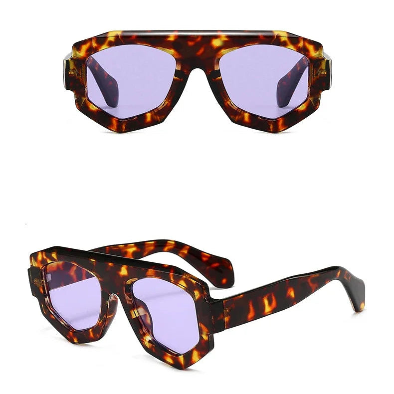 Sunglasses with tortoiseshell frame and purple lenses on a white background