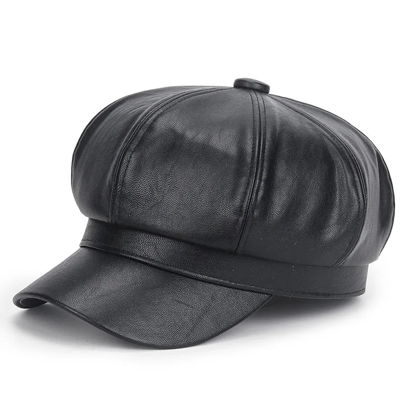 Black leather cap on a white background