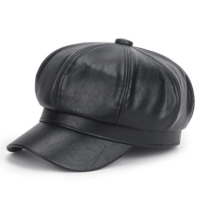 Black leather cap on a white background
