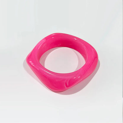 Pink bangle on a white background