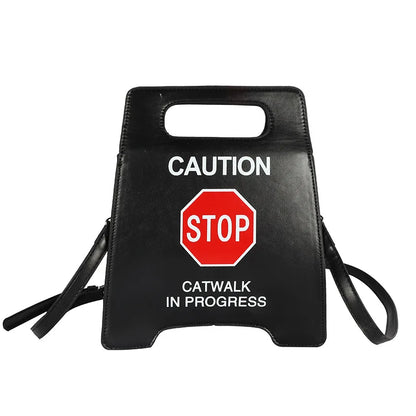 Black bag with a red stop sign and text on a white background