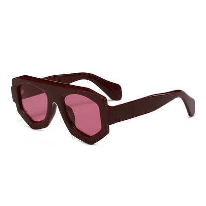 Sunglasses with brown frame and pink lenses on a white background