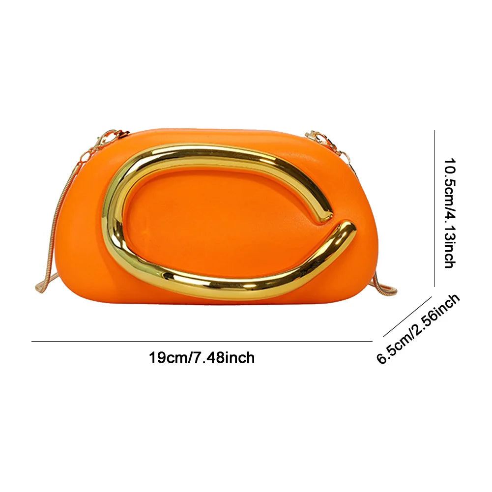 Orange clutch bag with gold handle and measurements on a white background